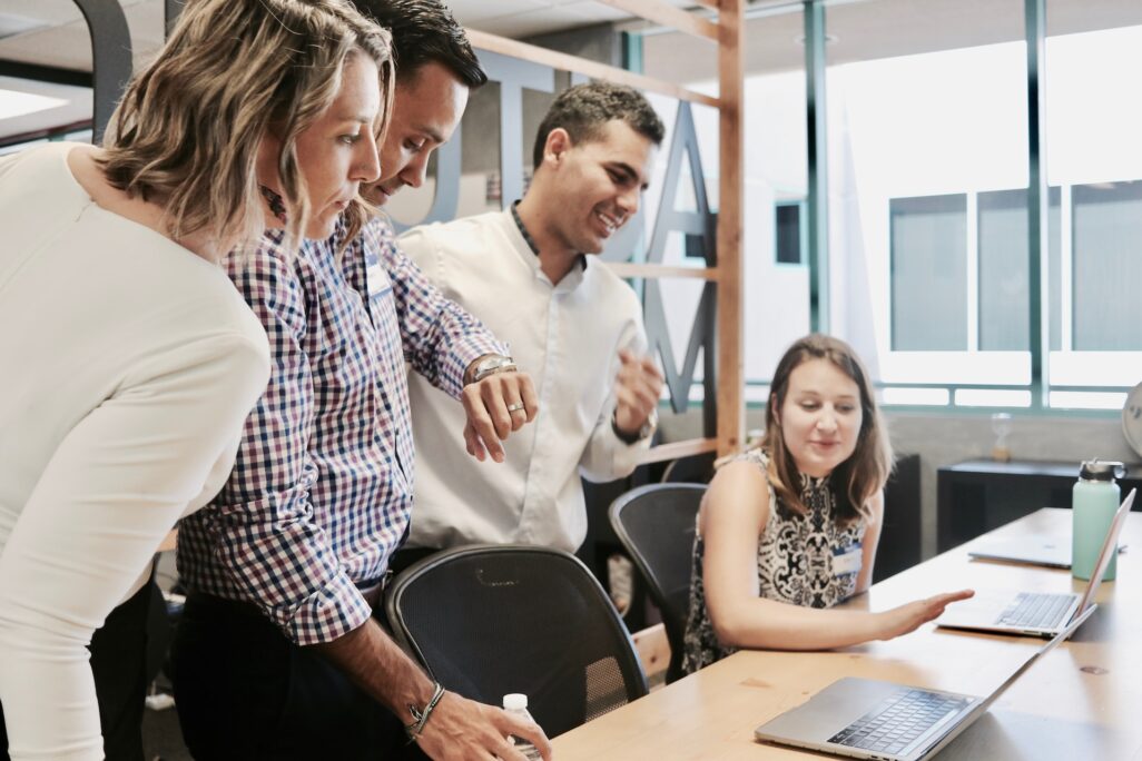man showing something on the computer