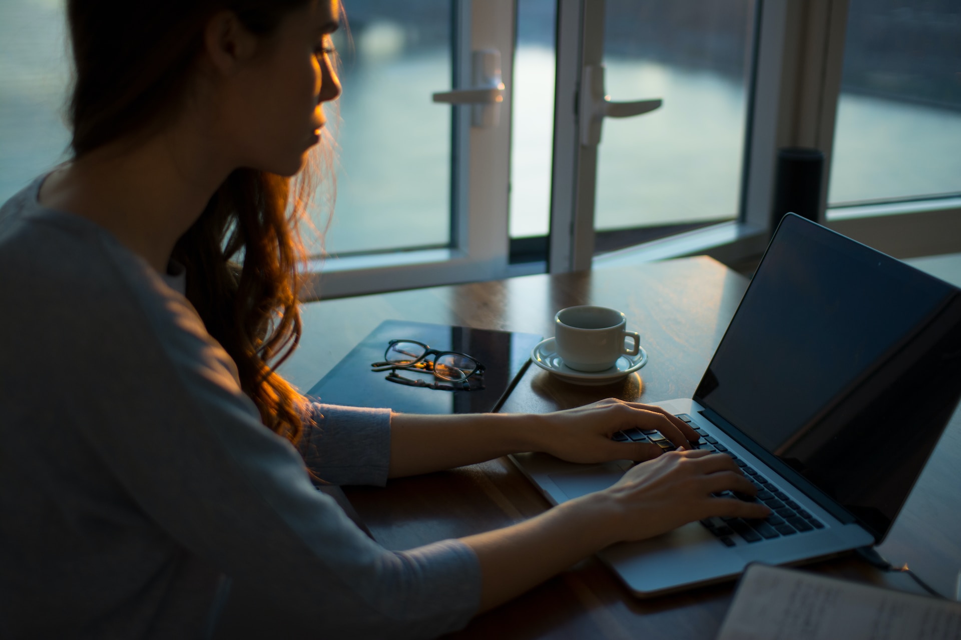 girl sitting near the computer
